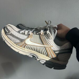 Nike Women's White and Gold Sneakers